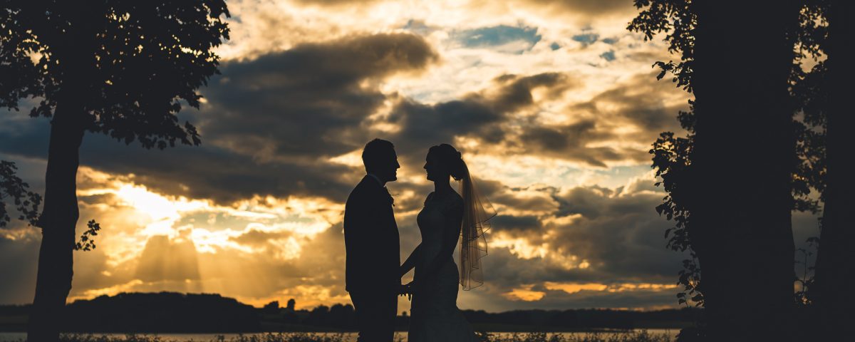 Normanton Park Hotel Wedding sunset photo of bride and groom silhouette