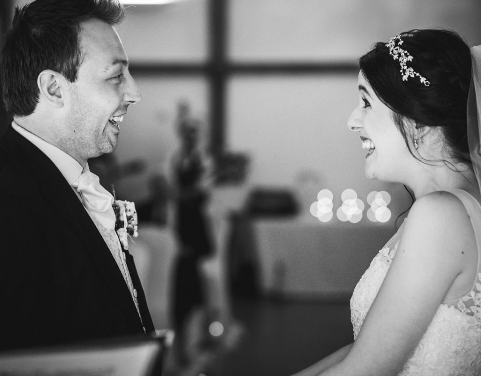Black and white couple saying vows Sandhole Oak Wedding Photography