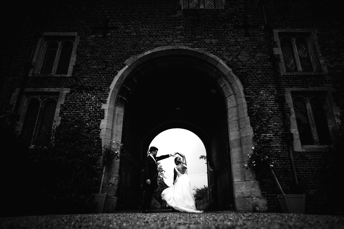 husband and wife dancing black and white hodsock priory wedding photography